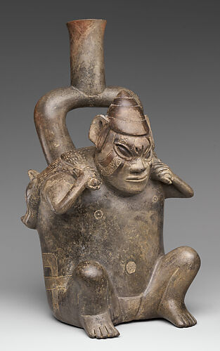 Stirrup-spout bottle with figure carrying deer