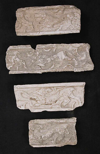 Fragments of a Frieze with Chasing Animals