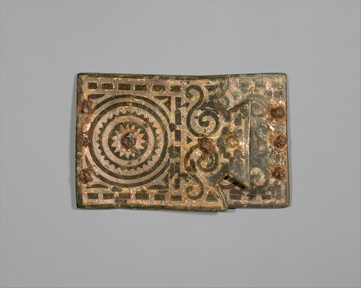Belt Clasp, Leaded bronze, inlaid silver, iron rivets, Celtic