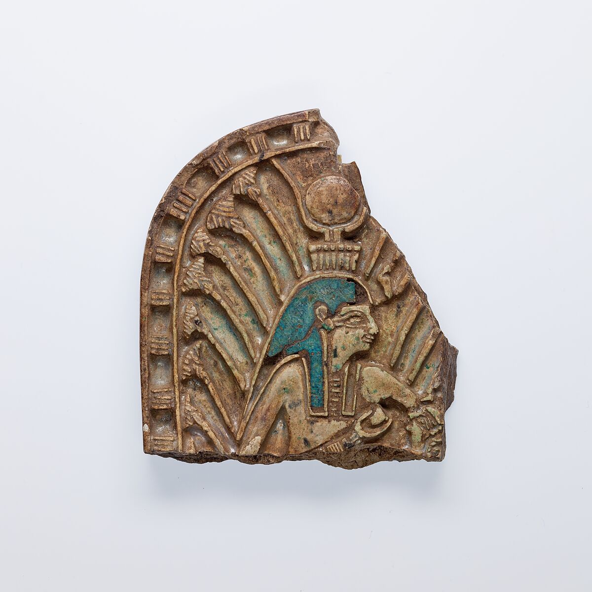 Isis nursing Horus in the marshes depicted on a fragment from a box lid or menat counterpoise, Glazed steatite